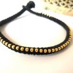 Black friendship bracelet, ..