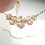 Gold Carrie necklace, Delic..