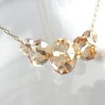 Gold Carrie necklace, Delic..