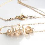Gold Carrie necklace, Delic..