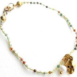 Charm Bracelet Multicolor Agate hand-knotted in silk with gold skull and freshwater cultured white pearl charms.